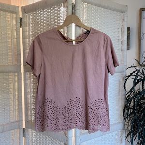 Microsuede blush top, laser cut detail at bottom.